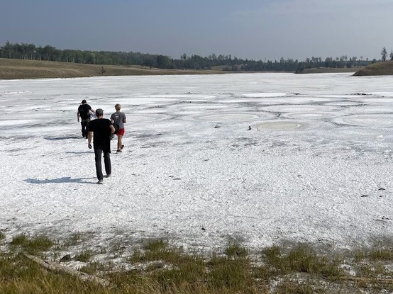 Scientists walking on Last Chance Lake