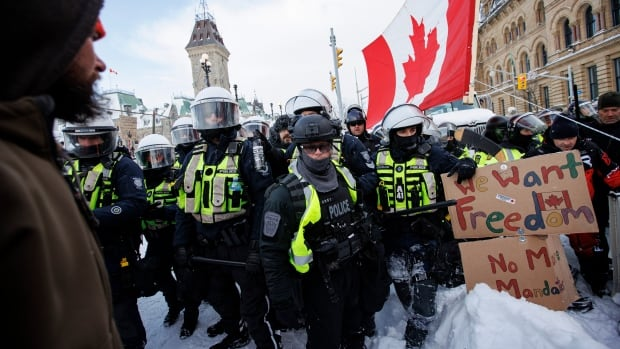 Police enforce an injunction against protesters in Ottawa on Feb. 19, 2022. (Evan Mitsui/CBC)