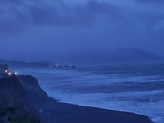 Blue and cool and comforting, with a few lights against the onset of dusk.  Thank you for the warmth and beauty of this day.  We hold hands when we can, and we try very hard not to leave anyone behind.