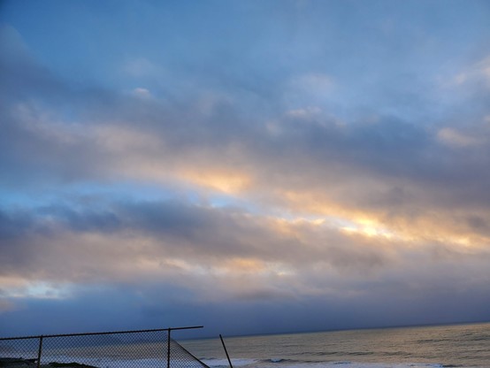 Old Sol may not have been directly visible, but it was still doing a bit of cloud-painting.  This was a lovely setup for dusk and twilight.