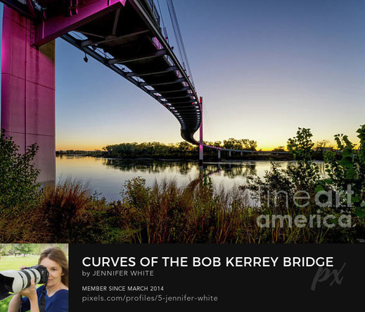 A cool view standing under the curves of the Bob Kerrey Pedestrian Bridge in Omaha, Nebraska before sunrise.
