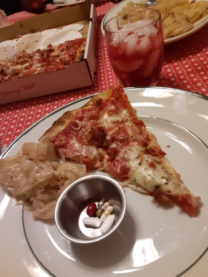 Meat eaters pizza. Pierogi with onions and brown butter. Sour cream. Pain meds du Jour. 