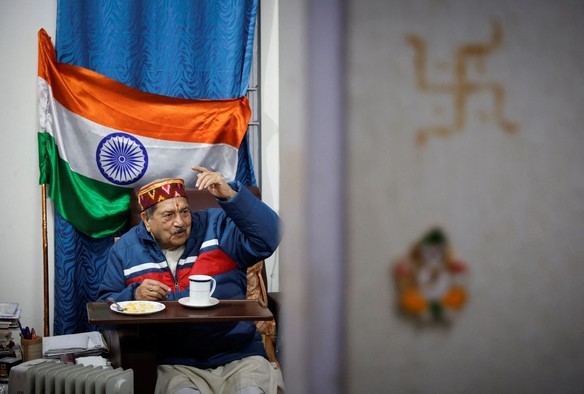 Indresh Kumar, a senior leader of the Hindu nationalist organisation Rashtriya Swayamsevak Sangh (RSS) gestures as he talks to people inside his office in New Delhi, India, January 26, 2024