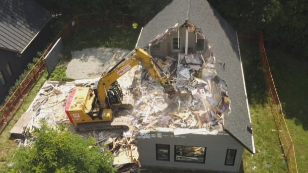 In September 2023, this TerraceWood house was demolished. CBC has learned it was one of three homes in the subdivison that Tarion has condemned. (Joe Fiorino/CBC)
