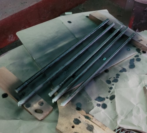 The exciting and thrilling adventure of spraying black paint on a bundle of sticks. Don't make the joke!