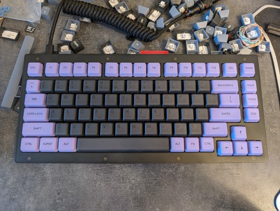 A picture of a mechanical keyboard with Signature Plastics G20 keycaps.