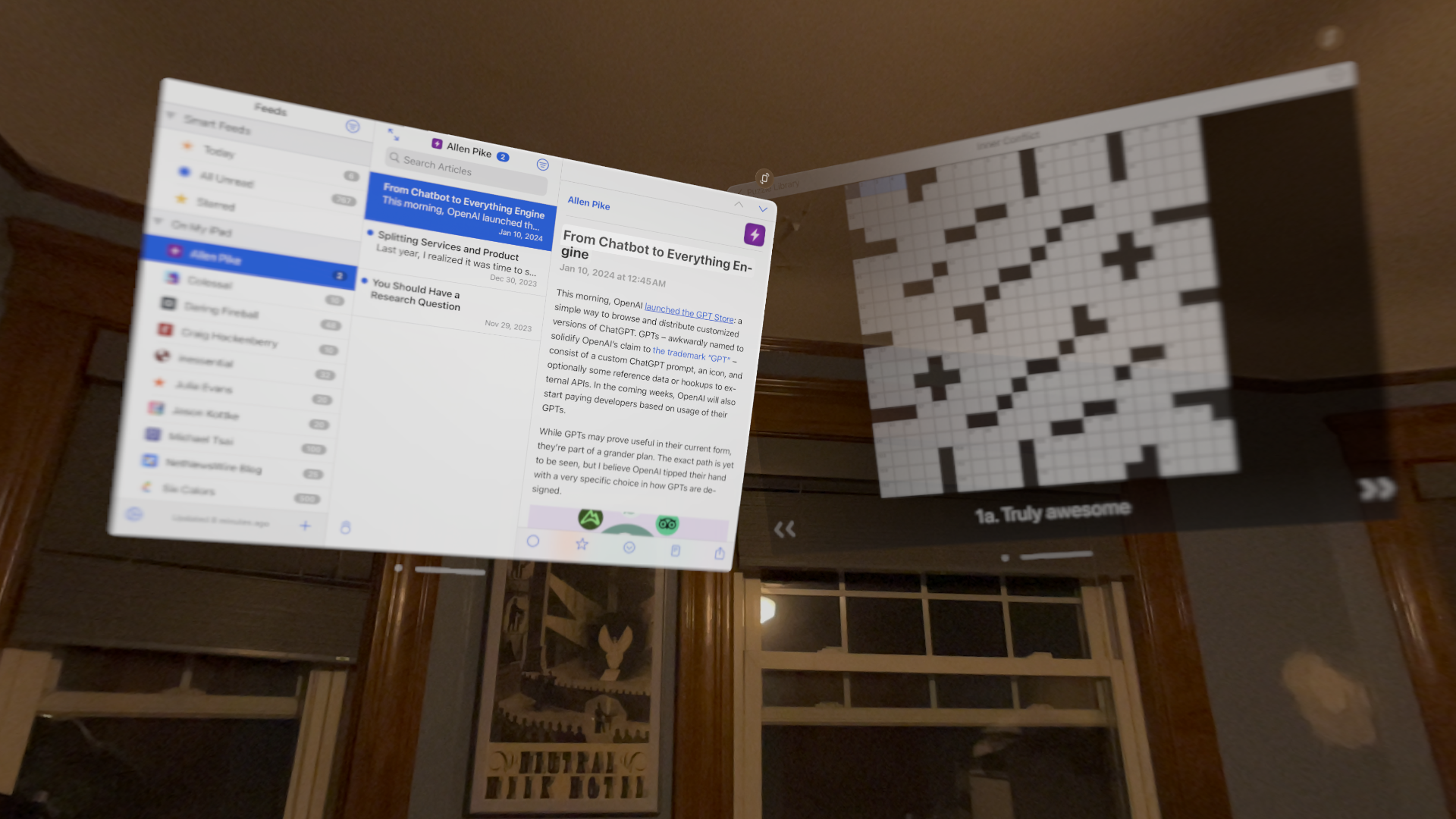 Screenshot of NetNewsWire and Black Ink Crosswords running in VisionOS against the backdrop of a room with windows.