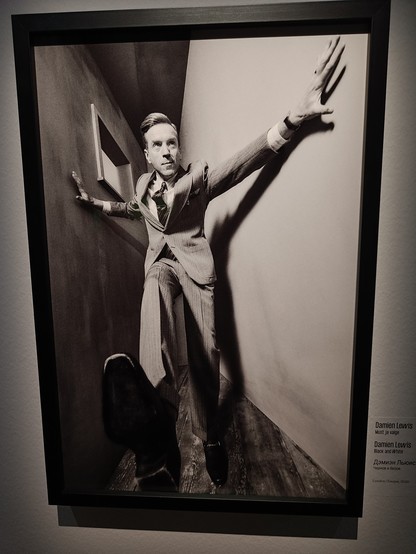 Weird photo, weird angles - an actor Damian Lewis is behind the walls in a small space 