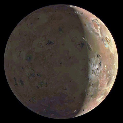 A gibbous Io, Jupiter's volcanic moon, lit by the Sun from the right and by reflected light from Jupiter on the left. Some pixelation due to image processing.
