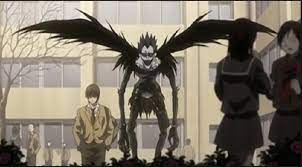Still from Death Note

(but Ryuk is not enjoying an apple)