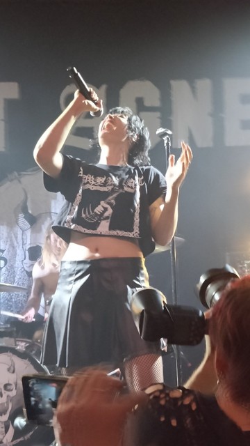 Photo of the band Saint Agnes on stage.