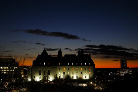 The Supreme Court of Canada ruled today on the constitutionality of Bill C-92, An Act Respecting First Nations, Métis and Inuit Children Youth and Families, which became law in June 2019. The Supreme Court of Canada is pictured at sunset in Ottawa on Wednesday, Dec. 13, 2023. THE CANADIAN PRESS/Sean Kilpatrick 