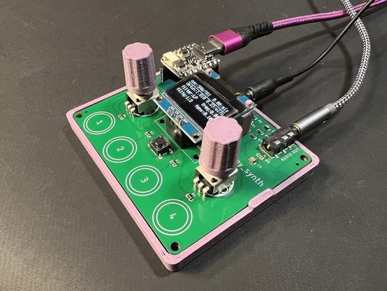 picture of the qtpy_synth PCB, which includes a QTPY RP2040, SSD1306 OLED, a MIDI in, an audio out, two pots, a tact switch, and four capsense buttons. All in a lavender 3d-printed case with 3d-printed knobs