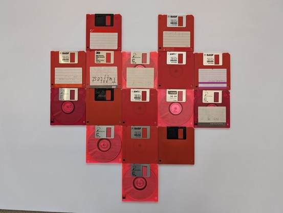 red floppy drives making the shape of heart
