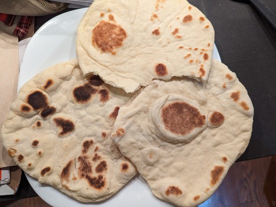 Naan bread cooked on cast iron skillet 