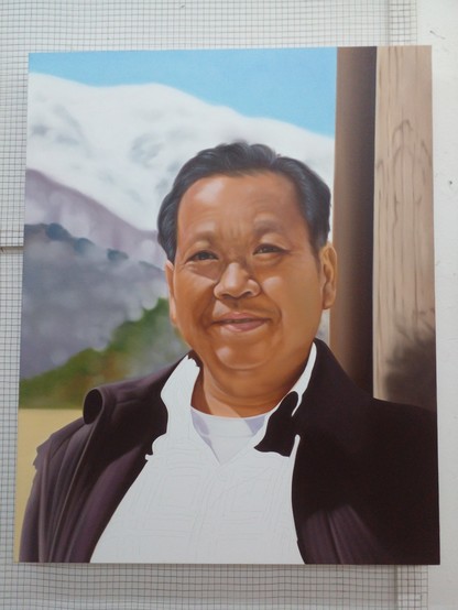a painting of a man, his dress shirt blank, unpainted, standing in front of mountains, snow on the one furthest away, blue sky above, he wears a heavy brown jacket and looks at the viewer, smiling, he has black hair 
