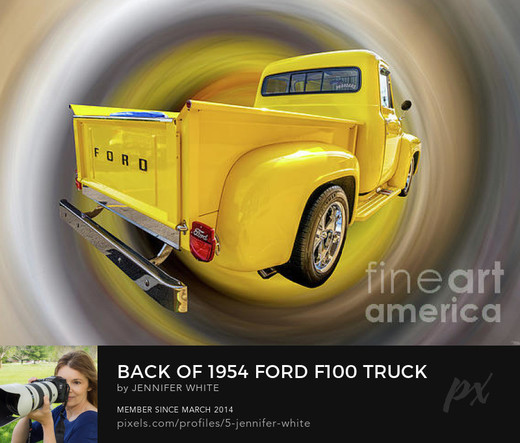 The back of a yellow 1954 Ford F100 Pickup Truck