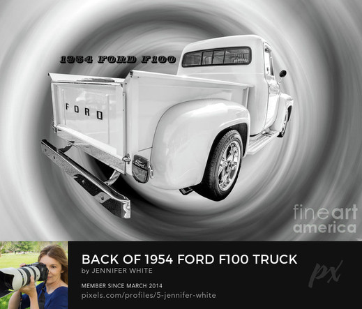 A black and white photo of a 1954 Ford F100 pickup truck.