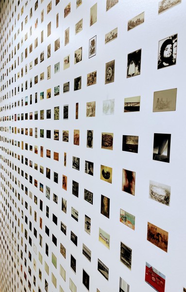 A wall inside the Williams College Arr Museum in Massachusetts, showing small icons of every piece of art in the collection