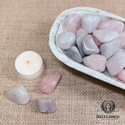 A photo of the "Lunar Rose Quartz Tumbled Gemstone" product from Inked Goddess Creations.