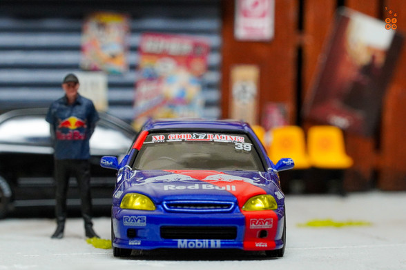 Honda Civic Type-R EK9 No Good Racing Red Bull Livery by INNO64 in 1:64 scale with 1:64 figure on area 164