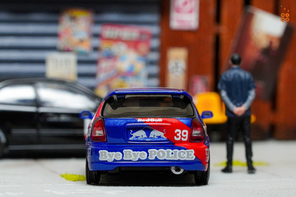 Honda Civic Type-R EK9 No Good Racing Red Bull Livery by INNO64 in 1:64 scale with 1:64 figure on area 164