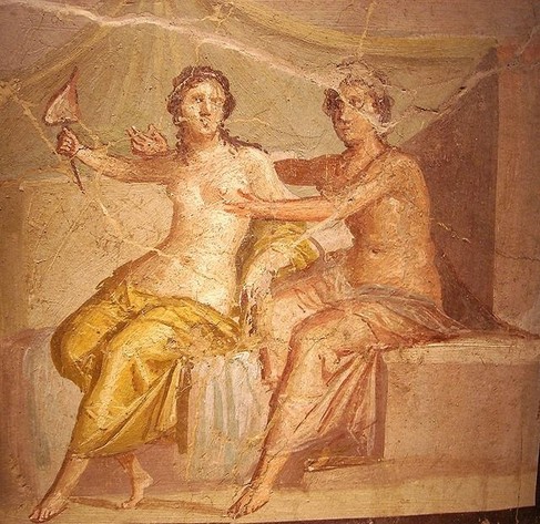 Roman fresco depicting Venus and Mars as lovers sitting side by side with Mars reaching out to caress Venus' breast.