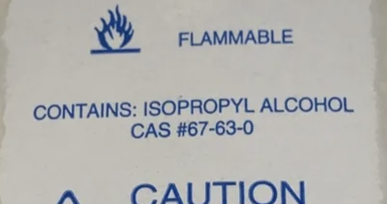 Label from the IBM cleaning fluid:

"FLAMMABLE, CONTAINS: ISOPROPYL ALCOHOL CAS #67-63-0."