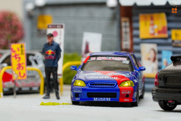 Honda Civic Type-R EK9 No Good Racing Red Bull Livery by INNO64 in 1:64 scale with 1:64 figure on area 164