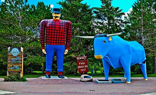 Photo featuring the statues depicting giant lumberjack Paul Bunyan and Babe the Big Blue Ox in Bemidji, Minnesota