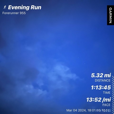 Screenshot of a cloudy, evening sky showing statistics for a run, with a distance of 5.32 miles, a duration of 1 hour 13 minutes and 45 seconds, and an average pace of 13 minutes, also shown are “Garmin Forerunner 955”