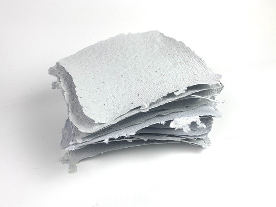 A pile of handmade paper.