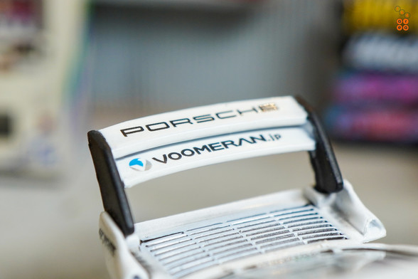 A close-up shot of Porsche RWB 930 Kamizawa by Tarmac Works in 1:64 scale with 1:64 figure on area 164