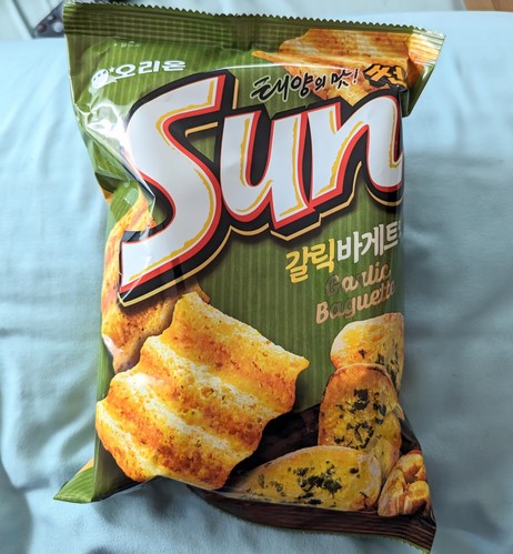 Image shows a bag of chips from Korea. They are Garlic Baguette flavored.