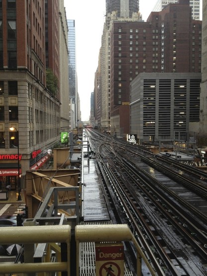 View looking north, up Wells Street, from the west platform of the Washington/Wells Chicago L platform on September 7th, 2012.