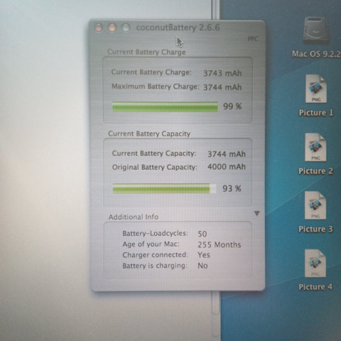 Photo of the "Coconut Battery" application running on the iBook, reporting a maximum battery charge of 3744mAh.