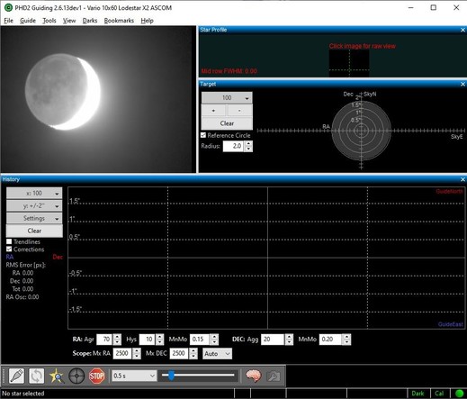 Screen capture from the program PHD2. Bottom of screen is an empty graph. Upper right is an empty target. Upper left is an image of the moon - there is a very bright and white (over-exposed) thin crescent on the right. The rest of the moon is dim but there are surface details discernible including darker "mares" and lighter areas.