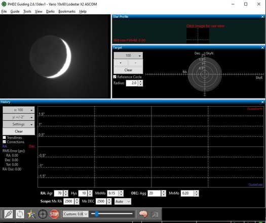 Screen capture from the program PHD2. Bottom of screen is an empty graph. Upper right is an empty target. Upper left is an image of the moon - a thin white crescent is on the right and the rest of the moon is dark grey with hardly any details discernible. 