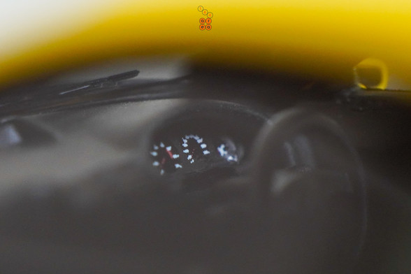 A close-up shot of yellow Honda Integra Type-R DC2 by Nice Auto in 1:64 scale with 1:64 figure on AREA 164