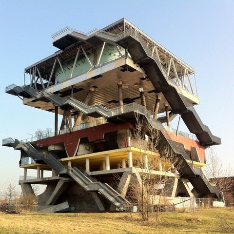 Ruins of the Dutch pavilion of the World Expo 2000, showing a semi-open building with several floors, external staircases.