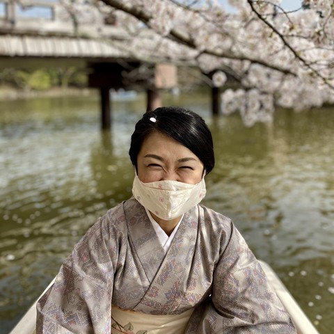 Boating beneath the blossoms at Sagi-ike.