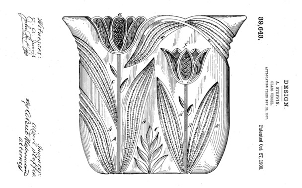 wide glass vase decorated with tulips