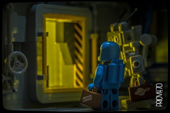 Blue LEGO astronaut holding a luggage with a sticker looking at an open door