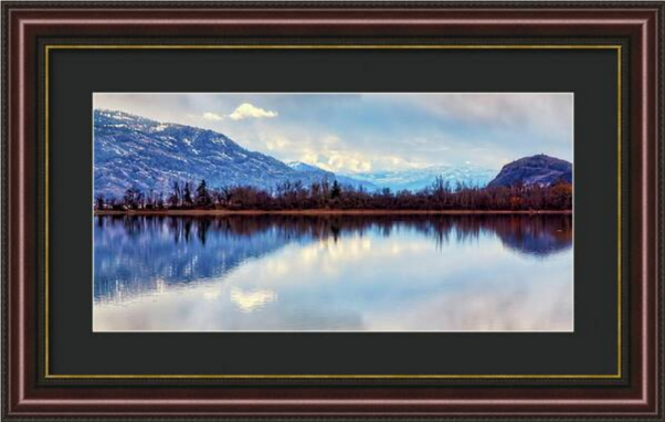 Winter end lake reflections in Penticton, BC, Canada