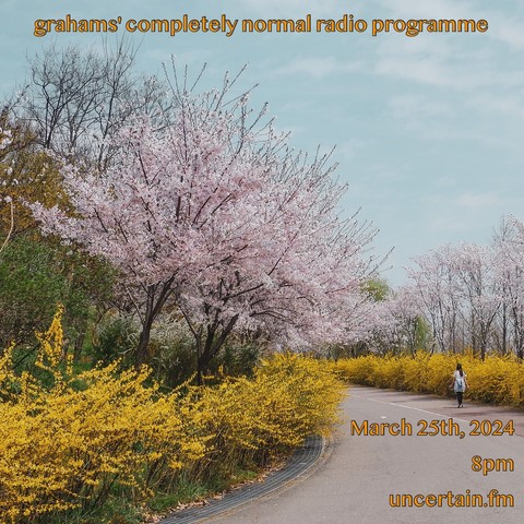 An asphalt path curving around trees blooming with yellow and pink flowers, a person walking away from the camera in the distance.

Orange text overlaid promoting a radio show, details in the main post.