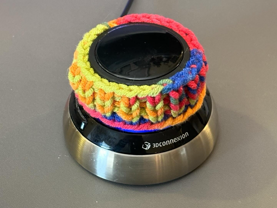 A knitted sock for a space mouse