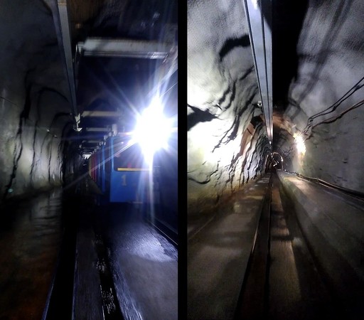 Zwei Bilder des Stollens der Hängestandseilbahn, vorne hinaus fotografiert: am ersten Bild kommt der Gegenzug entgegen, mit blauer Kabine samt Scheinwerfer vorne.
