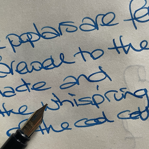 a writing sample of the new Edelstein Golden Lapis ink. Waterman pen, M nib, on Muji notebook paper. Pen freshly flushed. Phone image, unprocessed, 'SOOC'