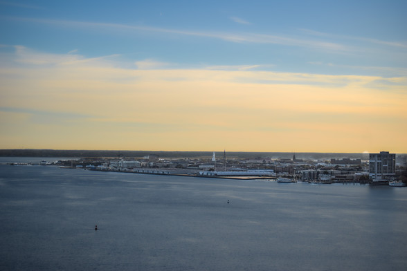 A wide angle view of the Charleston SC peninsula taken at dusk from the walkway of the Arthur Ravenel bridge.