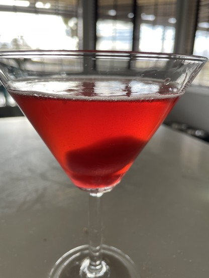 Same glass, after stirring. A lump of sorbet remains in the bottom.